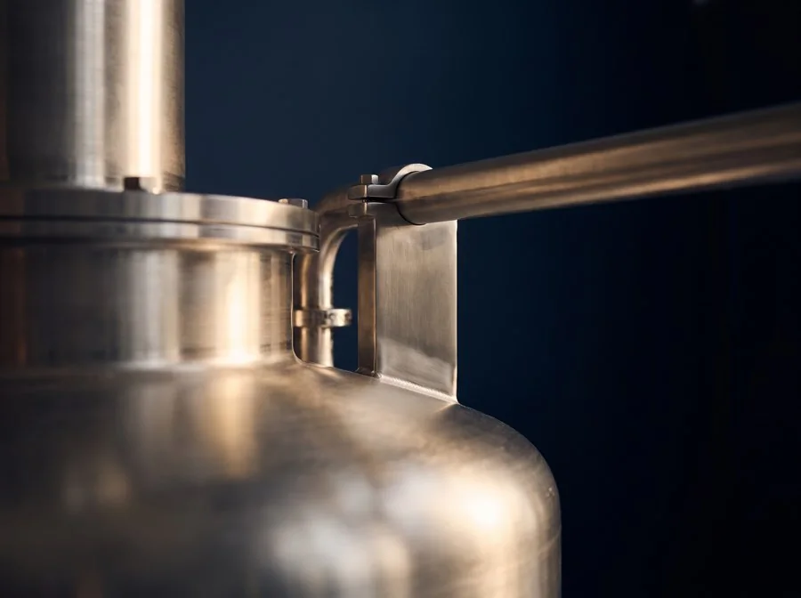 Brushed stainless production equipment lit from the side